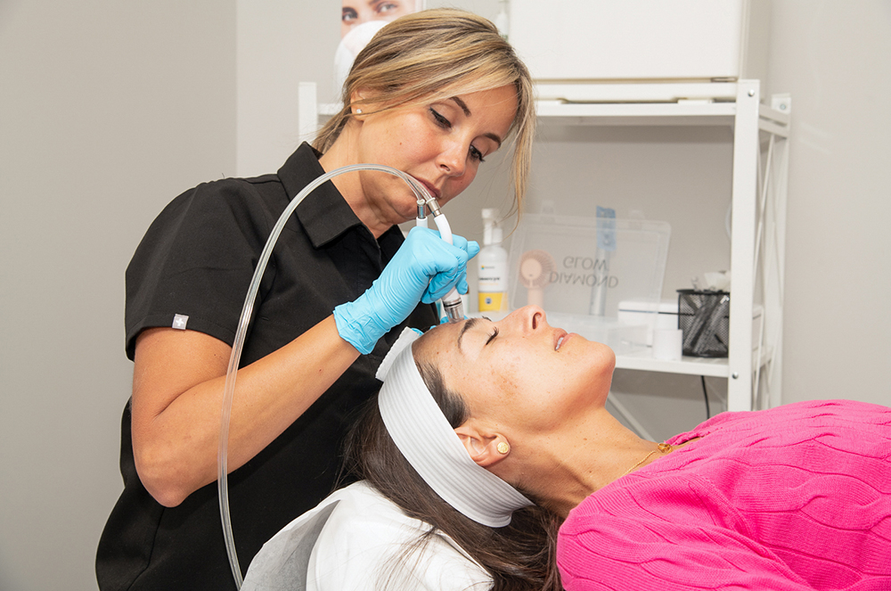 Woman getting DiamondGlow treatment