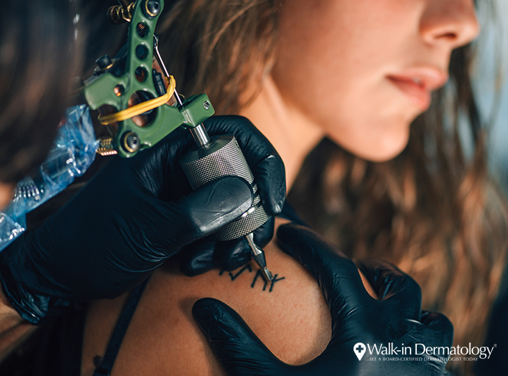 Woman getting a tattoo