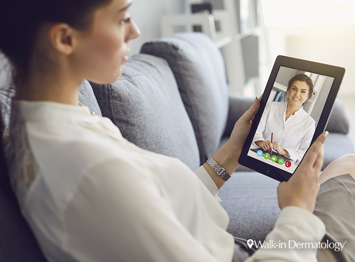 A patient having a virtual appointment with her dermatologist