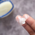 Man Putting on Petroleum Jelly