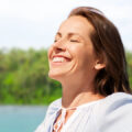 Woman smiling at the sun